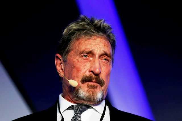 John McAfee oo maydkiisa laga helay xabsi ku yaal Spain