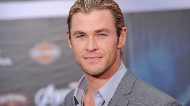 chris hemsworth with blond hair and ponytail