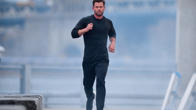 chris hemsworth runs outdoors