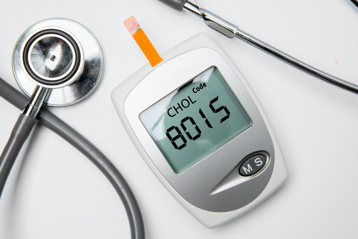 medical equipment for measuring cholesterol with a stethoscope on the table.