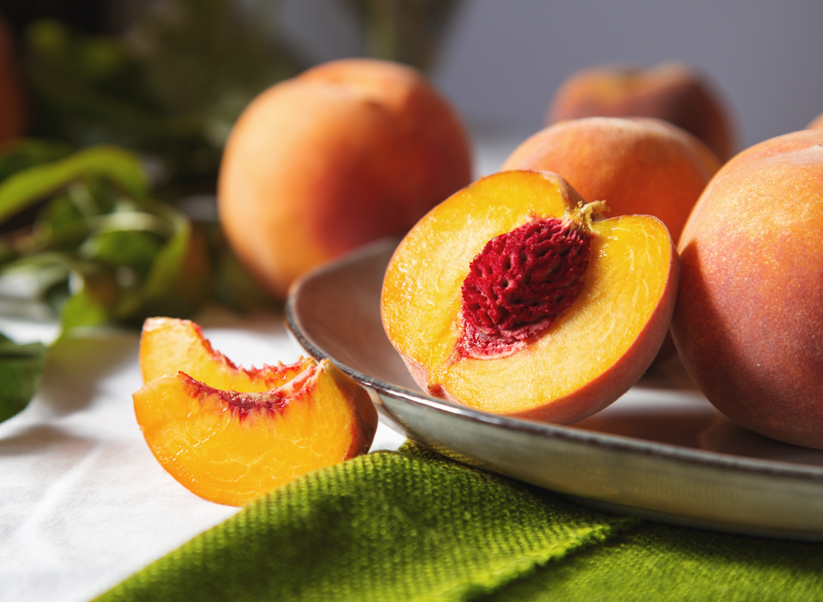 One Major Side Effect of Eating Peaches, Says Dietitian
