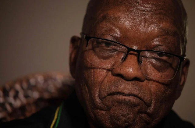 South Africa’s Zuma surrenders to police for