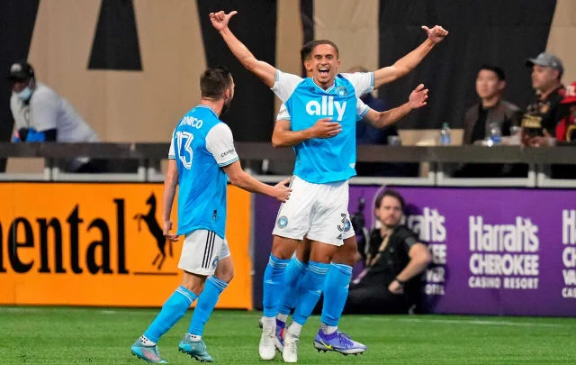 Adam Armor reacts to scoring the primary objective in Charlotte FC’s historical past