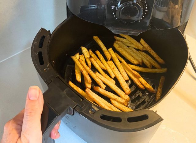 french fries inside air fryer basket