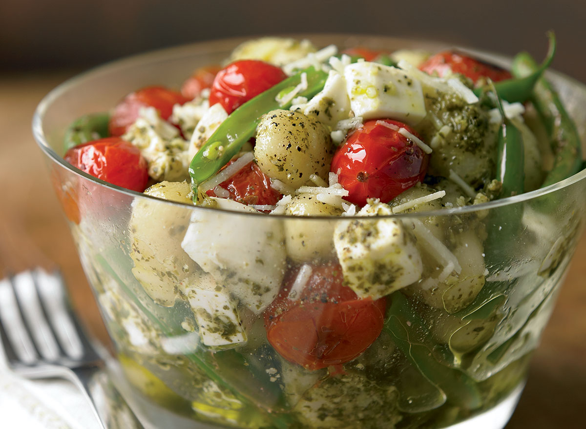 vegetarian pesto gnocchi with green beans and tomatoes