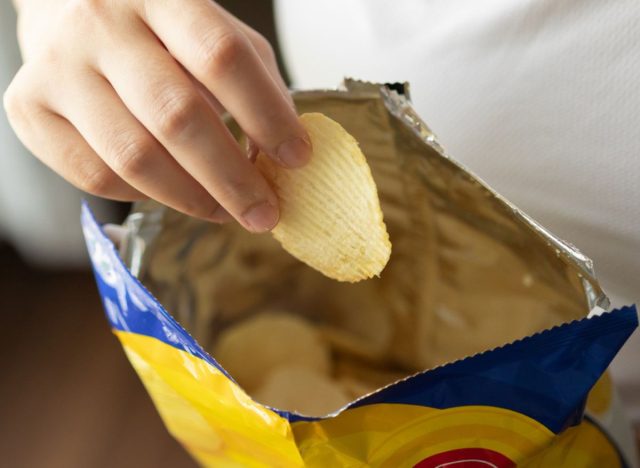 eat from a bag of chips