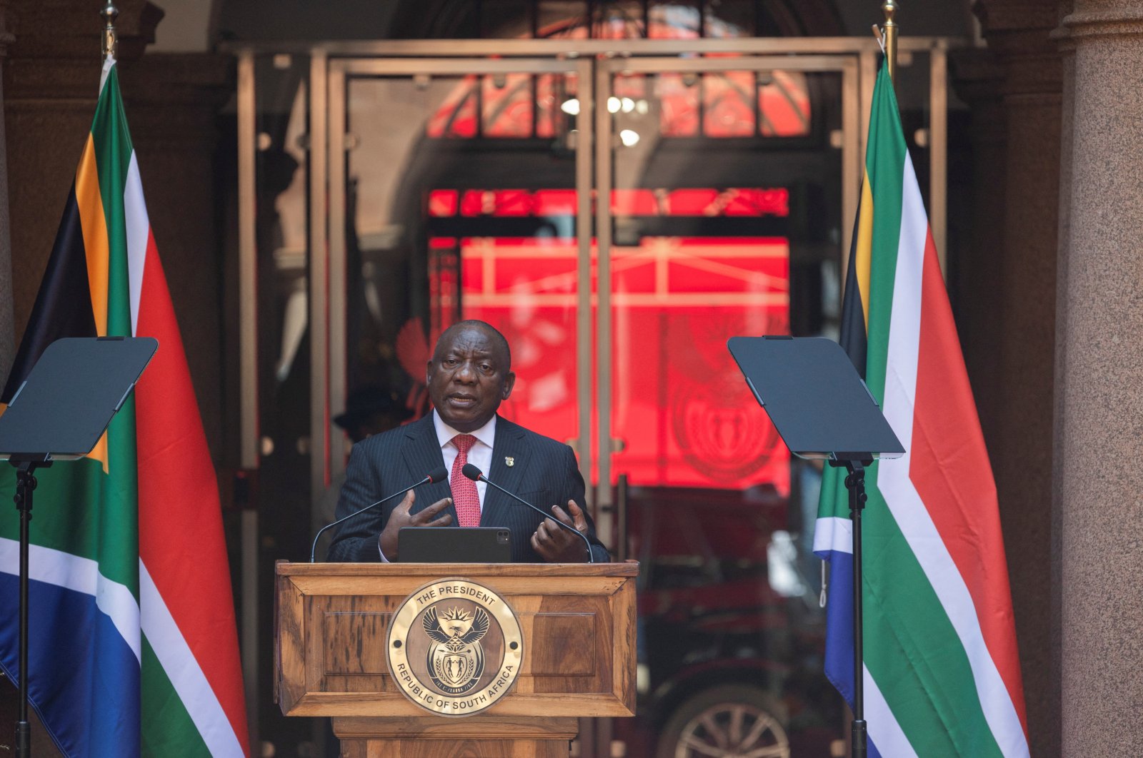 South Africa defies pressure, vows to pursue