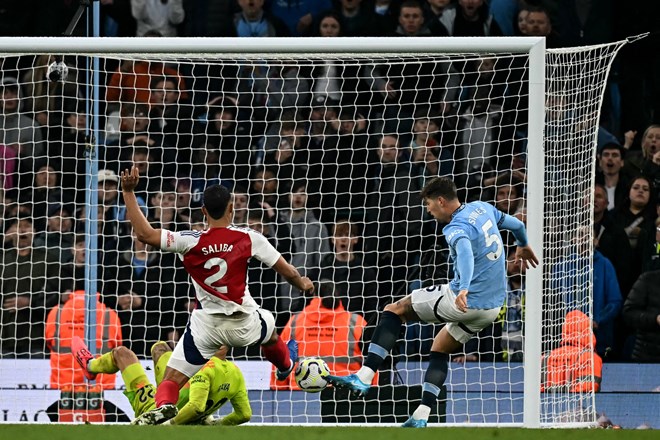 Stones saves late point for Man City in Premier League