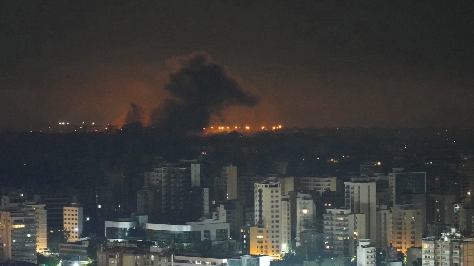Israel targets Hezbollah intel HQ, Iran says it will not back down