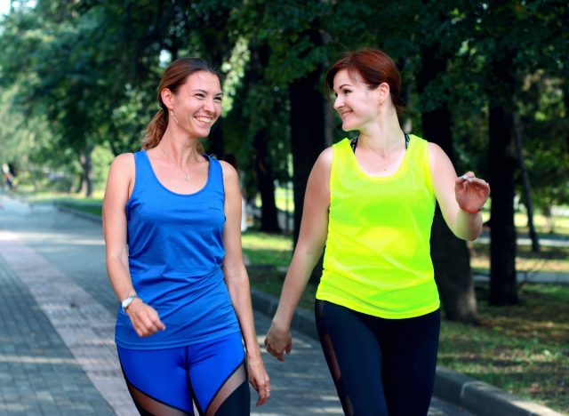the top daily walking exercise for effective weight loss. 19 two female friends walking outdoors
