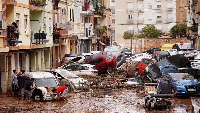 At least 95 people die in devastating flash floods in Spain