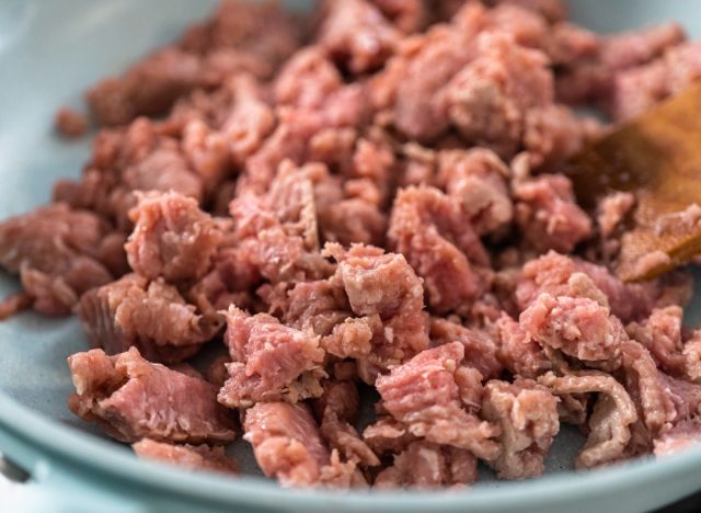 brown ground turkey in a nonstick skillet