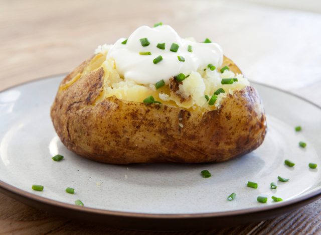 baked potatoes with butter and sour cream