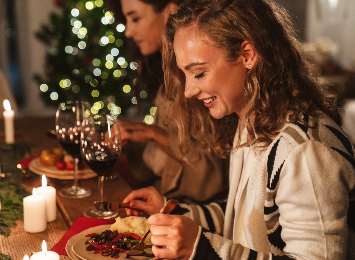 happy woman enjoying a holiday meal