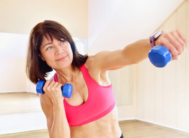 integrating strength and endurance workouts for effective weight loss 15 mature woman with dumbbells performing a breast lift workout