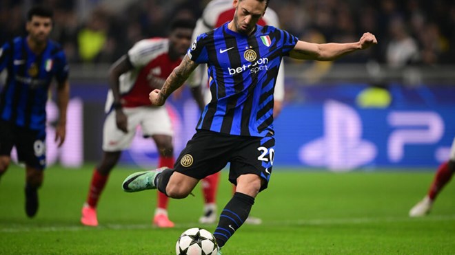 Inter Milan sink Arsenal in Champions League, Atletico sting PSG late on