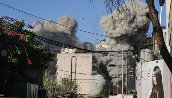 An Israeli strike in Beirut kills Hezbollah’s spokesman, while a strike in Gaza kills at least 30