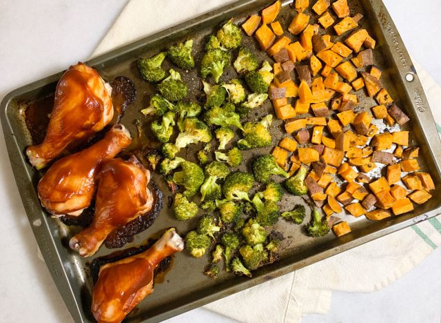 plate bbq chicken dinner on a marble bench