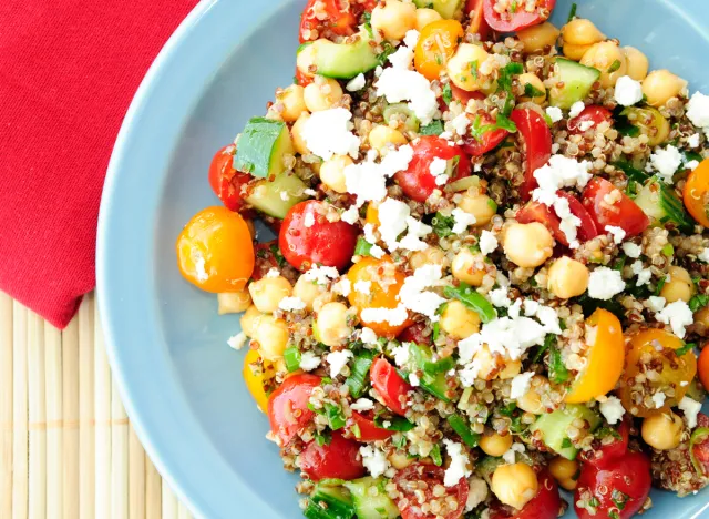 gluten-free vegetarian salad made with quinoa, chickpeas, feta cheese and fresh heirloom tomatoes