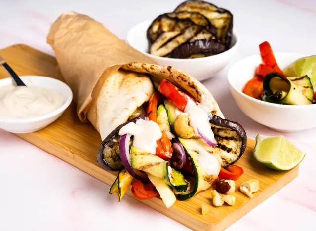 roasted vegetable of aubergine, zucchini and red pepper wrap