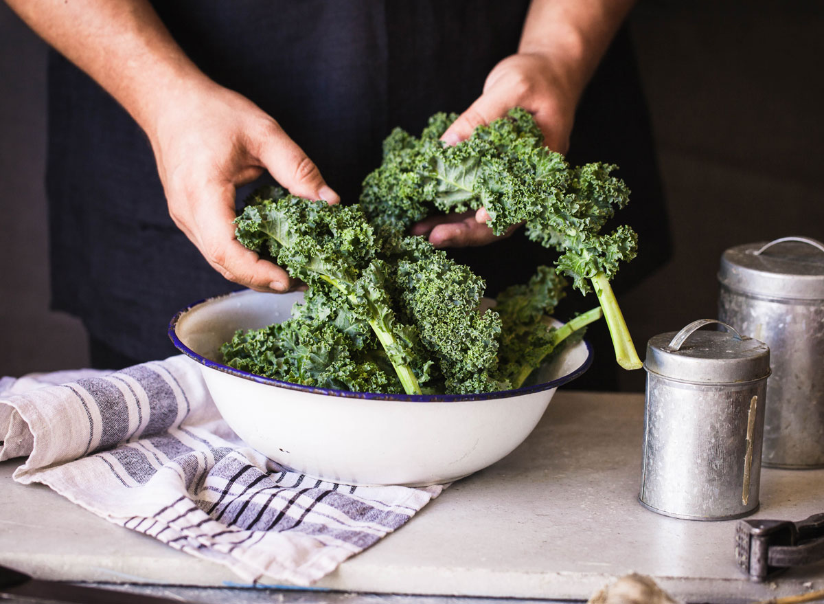 kale dark leafy greens hand massaged in bowl