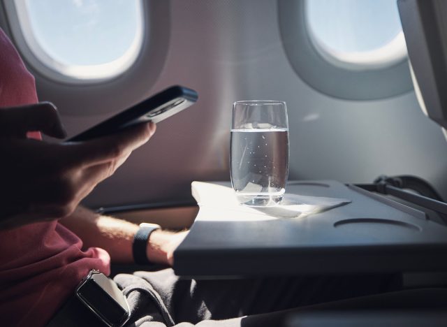 water glass on an airplane