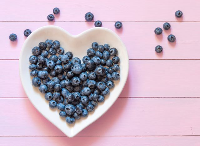 heart-healthy food concept, blueberry in heart-shaped bowl