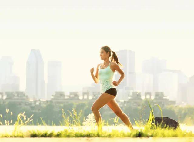 fit woman jogging in the park, representing effective exercises for weight loss