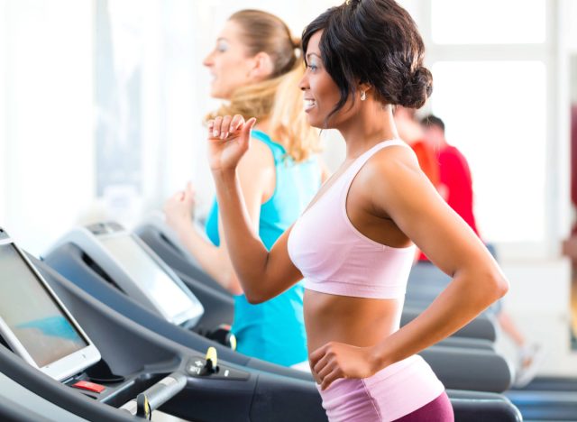 optimal duration of treadmill exercise for belly fat reduction 19 fit woman exercising on treadmill, the concept of beginner treadmill exercise for weight loss