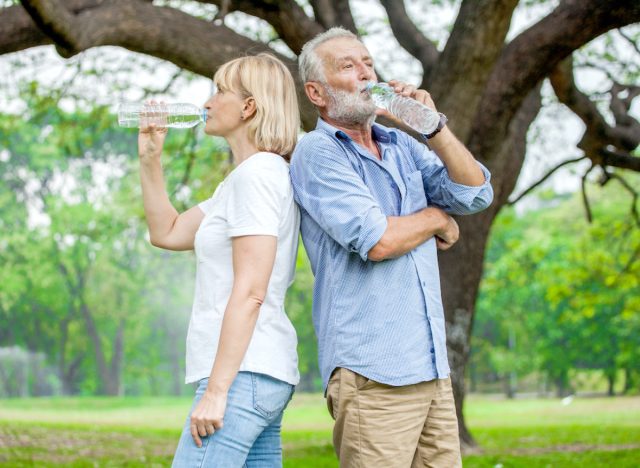 older couple drinking water