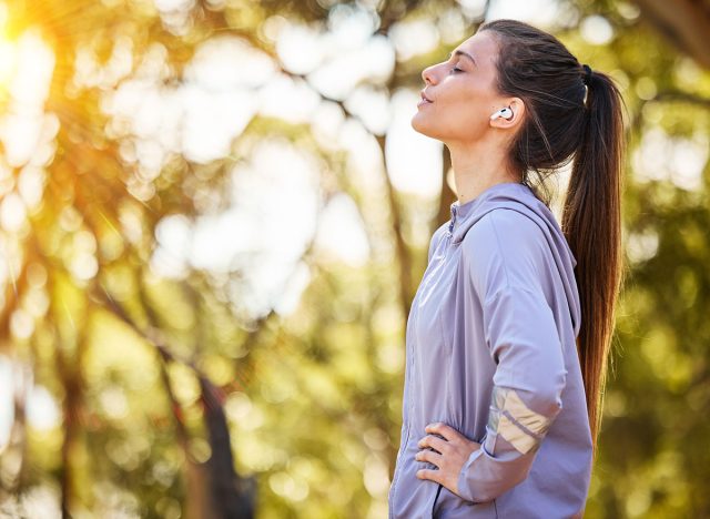 person enjoying nature and focusing on fitness