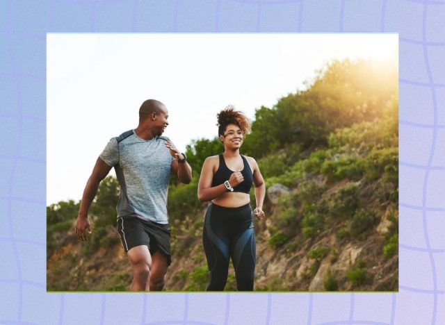 two people walking in an idyllic mountain setting