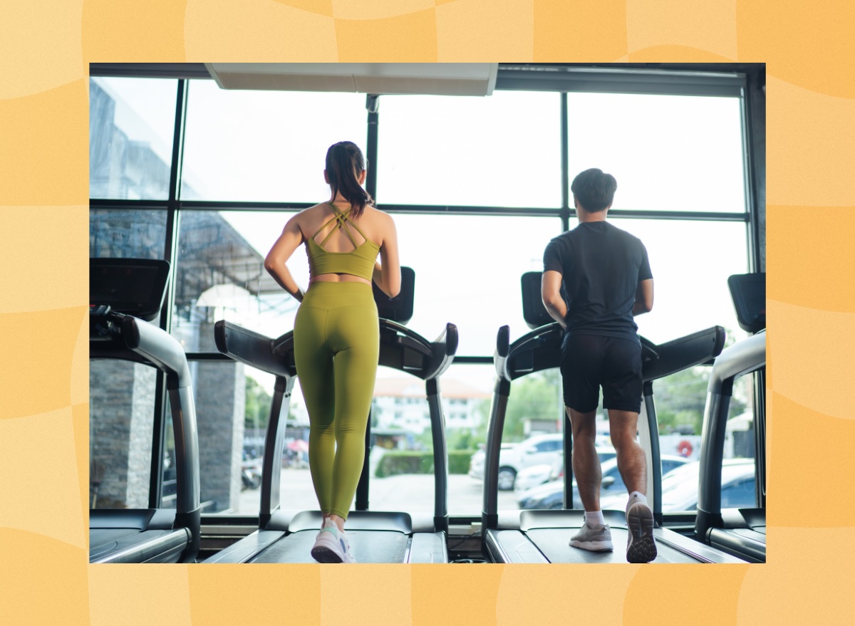 couple walking on treadmills