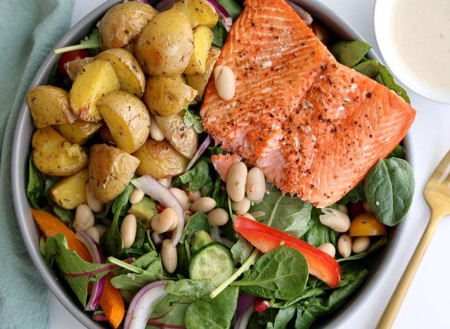 high protein salmon potato bean salad with creamy lemon dressing over your head
