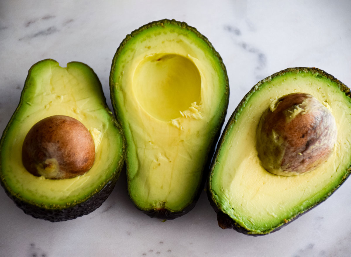 halved avocado with pit