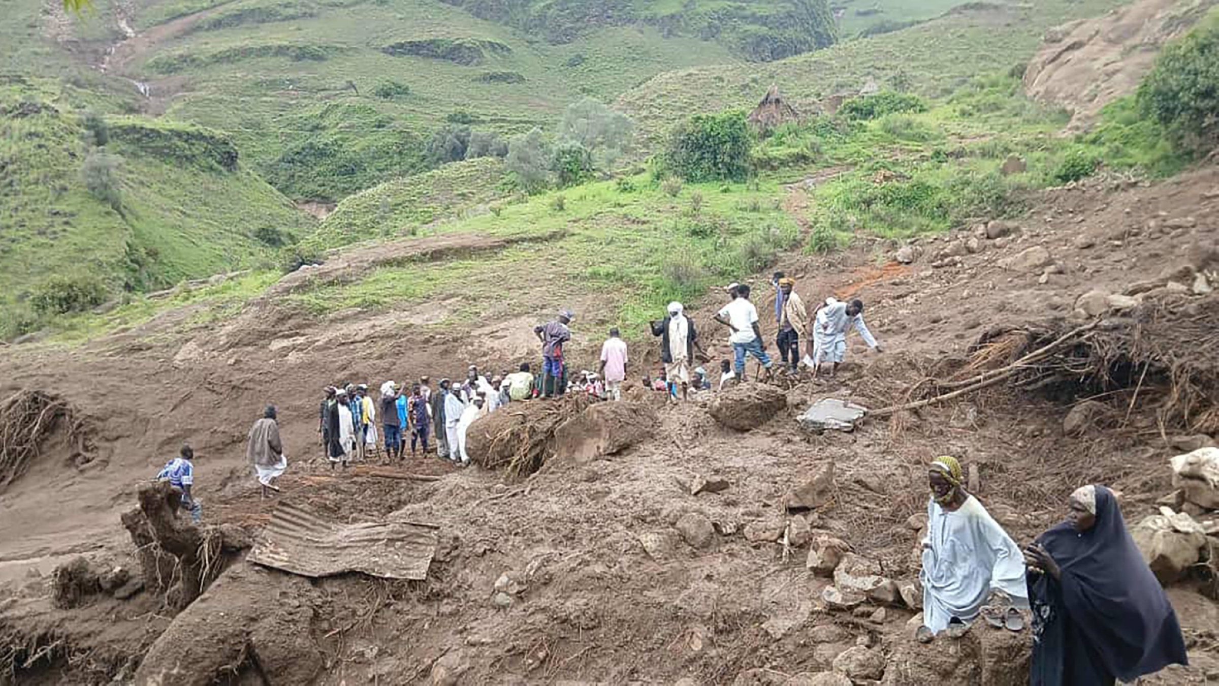 Over 1,000 dead when landslide buries village in