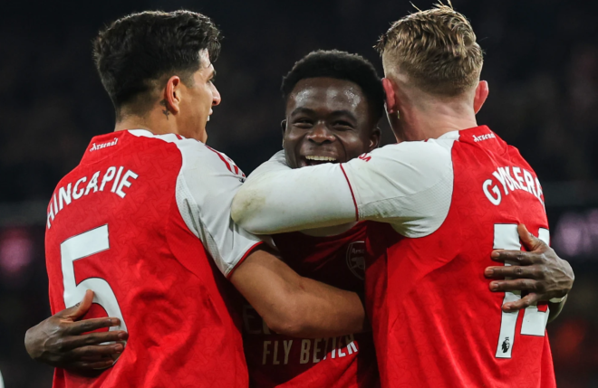 Salah returns to lead Liverpool past Brighton; Arsenal edge Wolves via two own goals