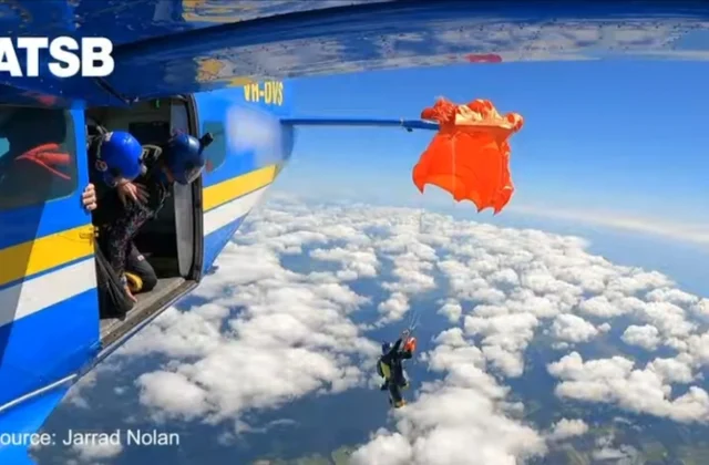 Video captures moment skydiver dangles from airplane tail during flight