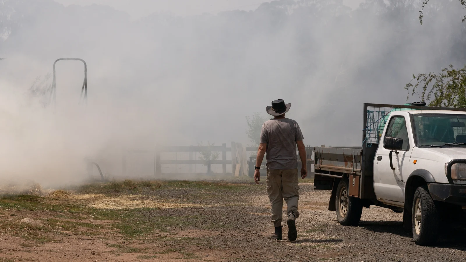 Dozens of homes destroyed, one killed as Australian bushfires rage