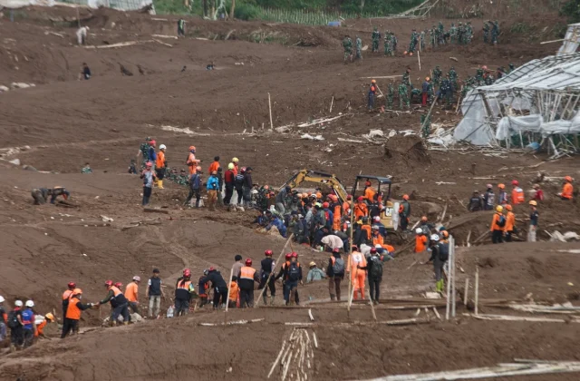 Indonesia landslide kills 17 as search continues for dozens missing