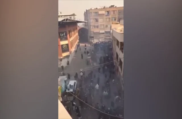 Iranian forces deploy tear gas in Tehran bazaar as protest deaths climb
