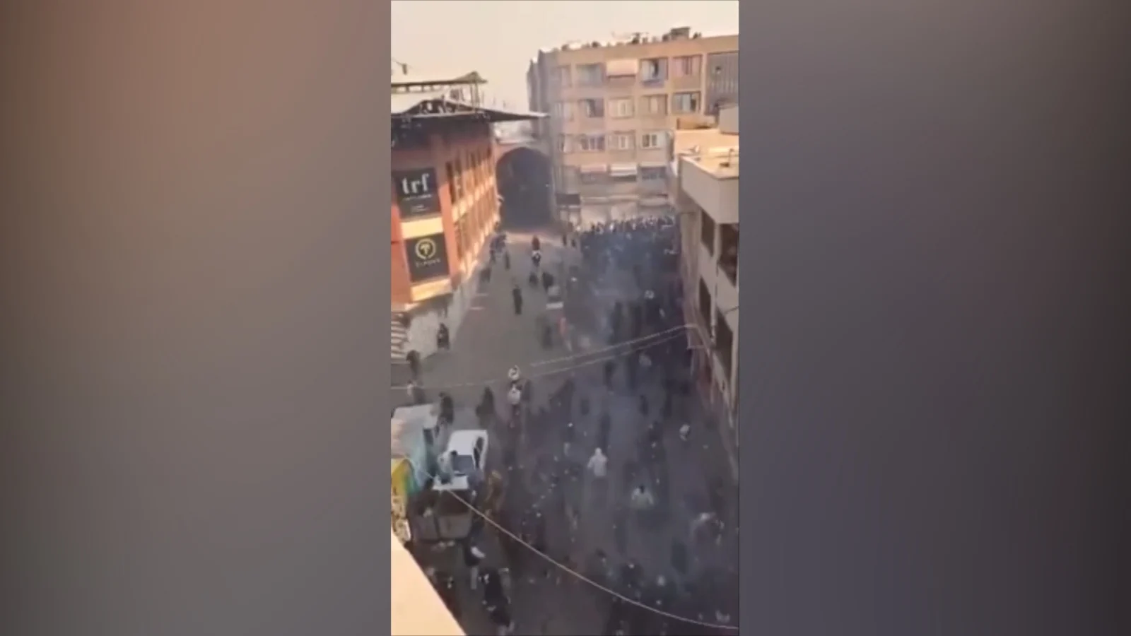 Iranian forces deploy tear gas in Tehran bazaar as protest deaths climb