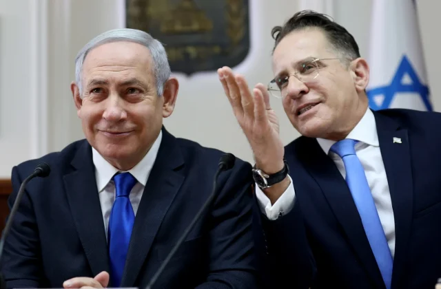 Top Netanyahu aide detained by Israeli police in high-profile case