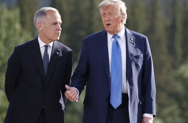Trump vows 100% tariffs if Canada signs trade agreement with China