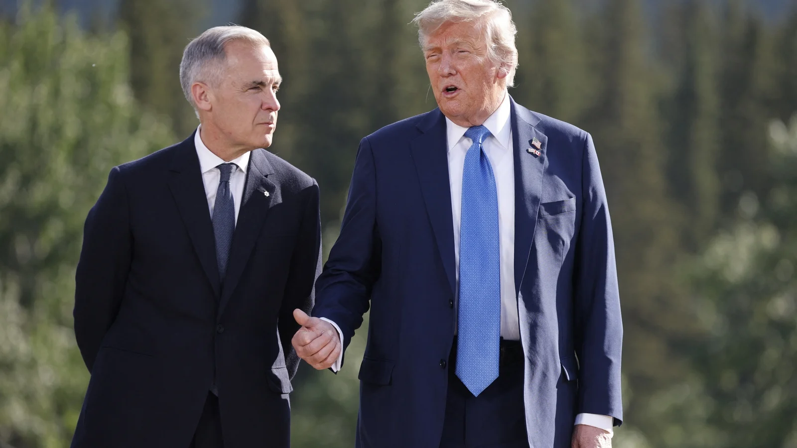 Trump vows 100% tariffs if Canada signs trade agreement with China