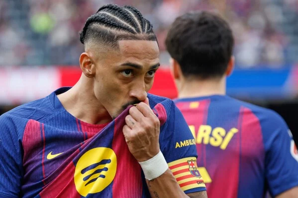 Raphinha hat-trick keeps Barcelona four points clear in La Liga