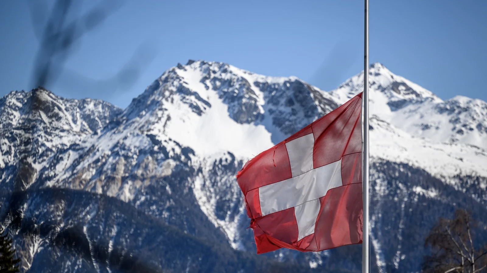 Four officials charged over fire at Swiss ski resort