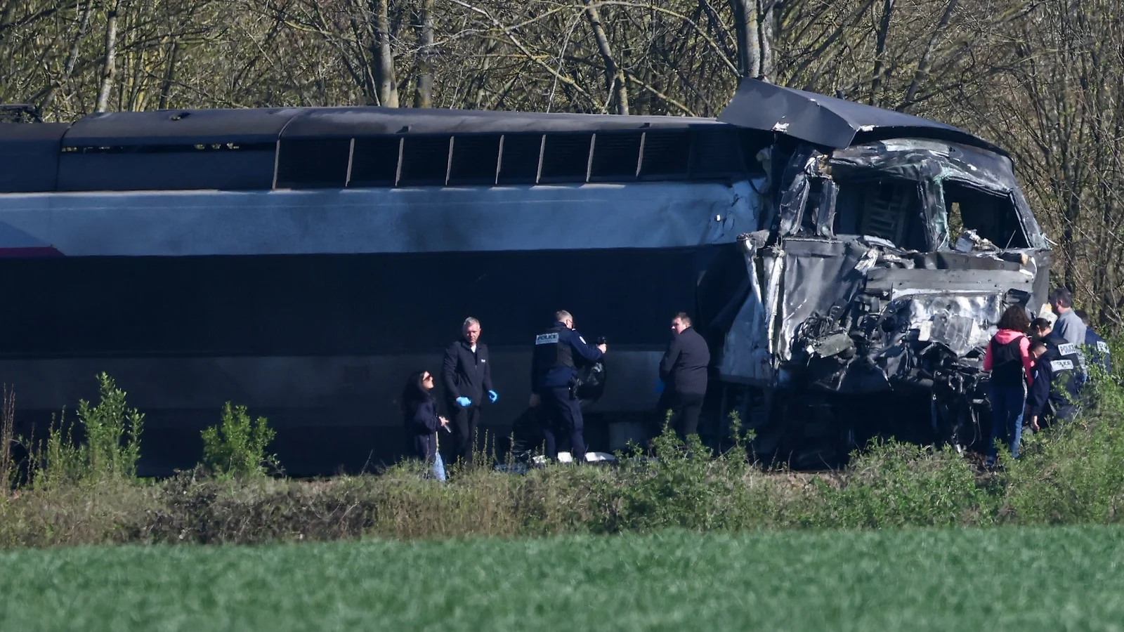 French high-speed train collides with truck, killing driver and critically injuring two