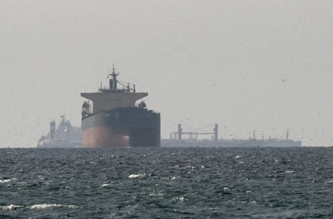Iran seizes two vessels in Strait of Hormuz after ship comes under fire