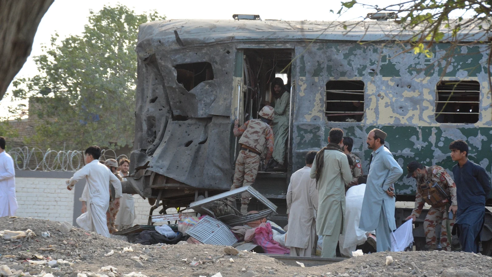 Blast on train in Pakistan kills dozens of people